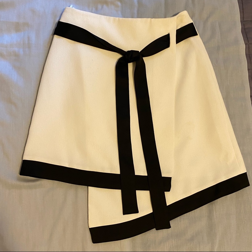 Asymmetrical white skirt